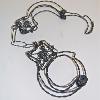 Image # 5:  Wire Project, Intro to 3D Design 2008  Hand Cuffs, 12" x 6"  Rebar tie wire