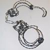 5. “Wire Project, Handcuffs”, Intro to 3D Design, 12" x 6"  Rebar tie wire